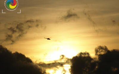 Helicopter in the clouds